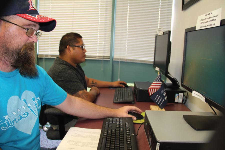 Students sitting and working on computers